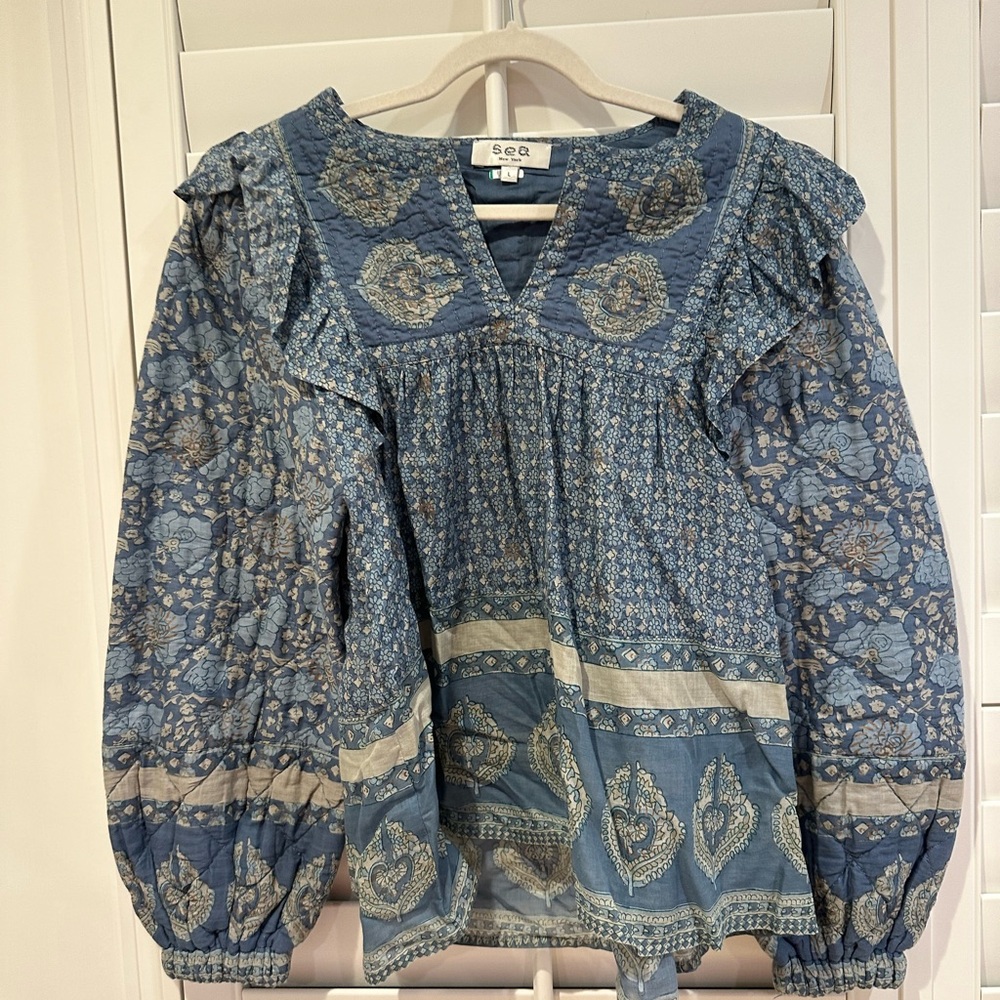Sea top worn once and dry cleaned